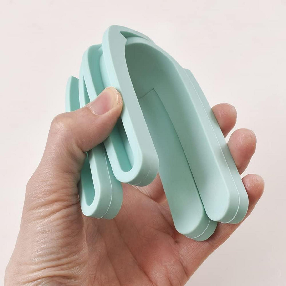Zusammenklappbare Silikon Topfuntersetzer erweiterbar Kreuz-Design 4er
