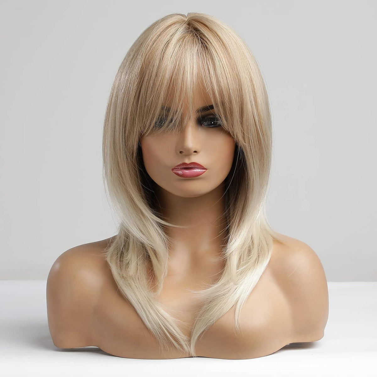 Lange blonde Lockenperücke mit Pony – Schulterlang & Hitzebeständig