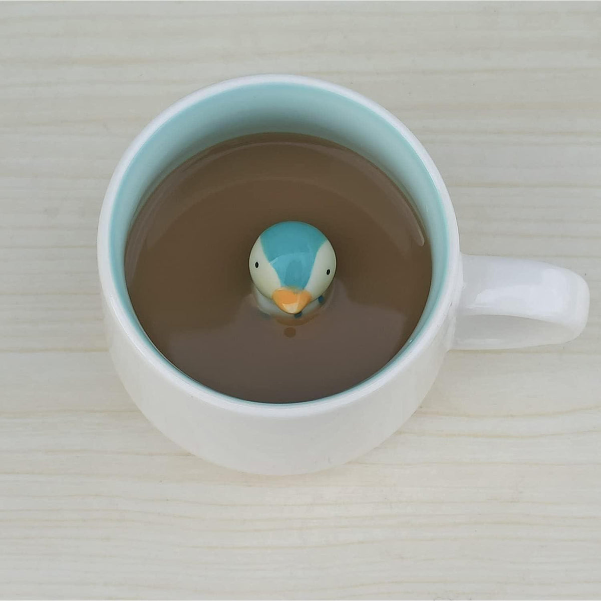 3D Pinguin Kaffeetasse mit Überraschung im Boden