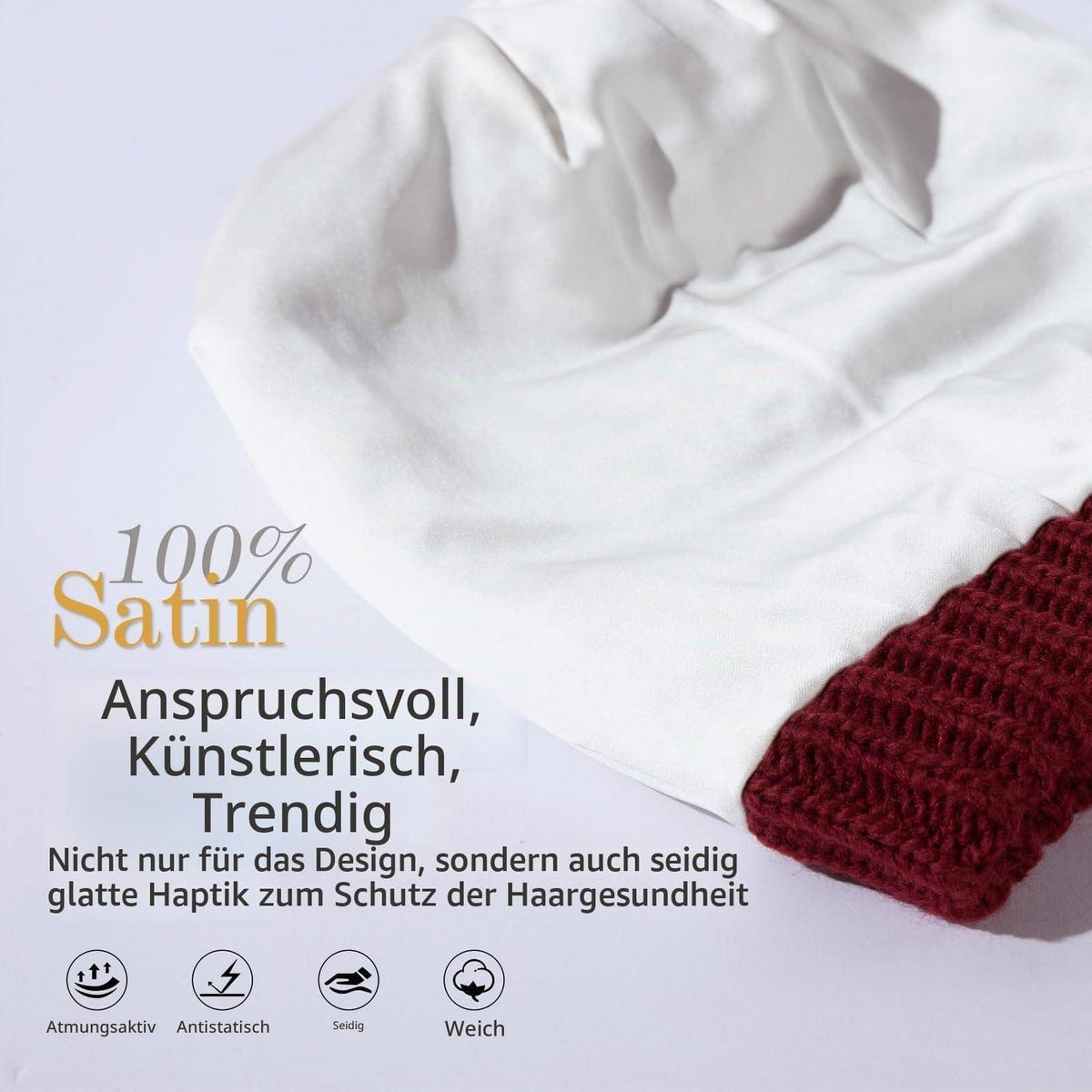 Damen Wintermütze aus 100% Wolle mit Kunstfell-Bommel und Satin-Futter