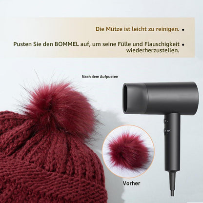 Damen Wintermütze aus 100% Wolle mit Kunstfell-Bommel und Satin-Futter